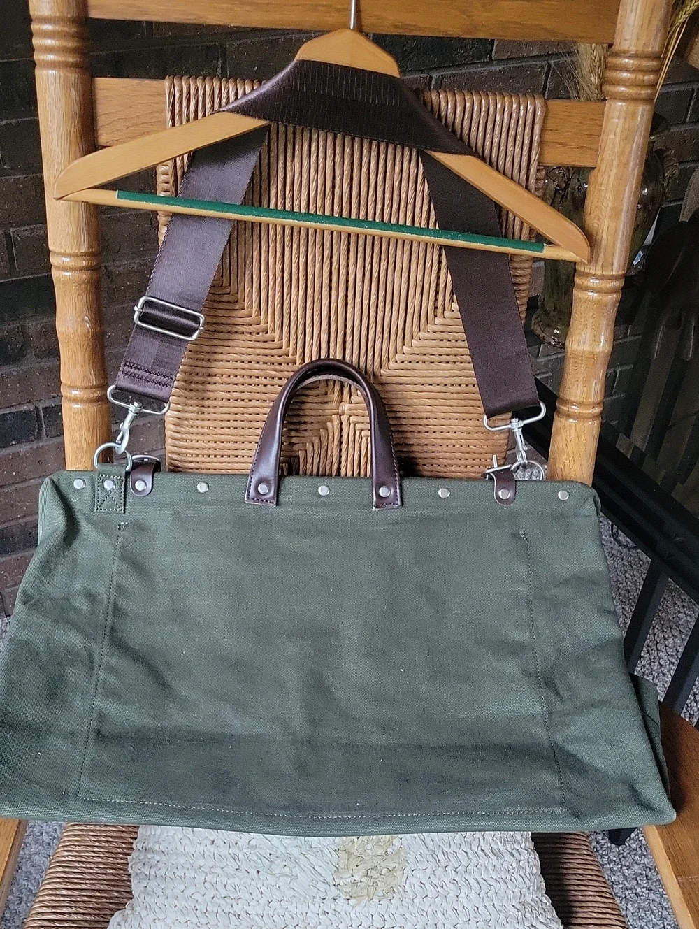 Line of Trade green military duffle sack with brown canvas strap